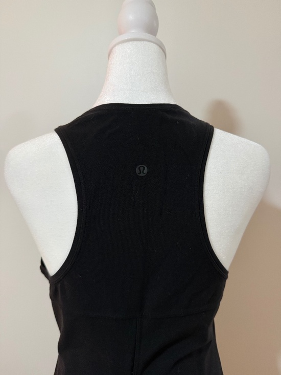 lululemon athletica Dresses & Skirts - So comfy! Black Lululemon Dress with Racer back and side slits! Dress up or down
